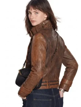 Distressed brown leather The Bride Premiere Mia Regan Leather Jacket showcasing unique loop button front details.