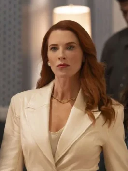 Close-up shot of Monica Stevens from The Rookie in an off-white leather trench coat with notched lapel collar
