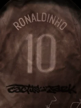 Modern CJ X Nike Athletes Ronaldinho Retro Jersey in multicolor polyester with comfortable half length sleeves.