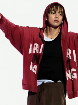 Full look of the red fleece BTS Arirang NY Hoodie showing rib knitted cuffs and smooth zipper closure.